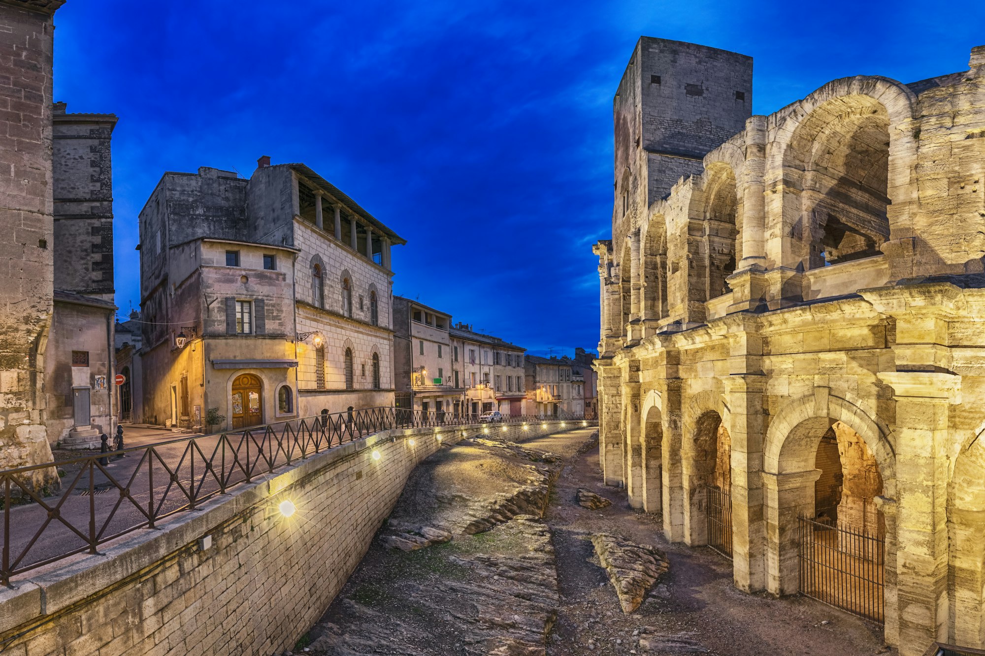 Roman amphitheatre at dusk in Arles, France