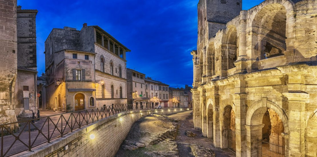 Roman amphitheatre at dusk in Arles, France